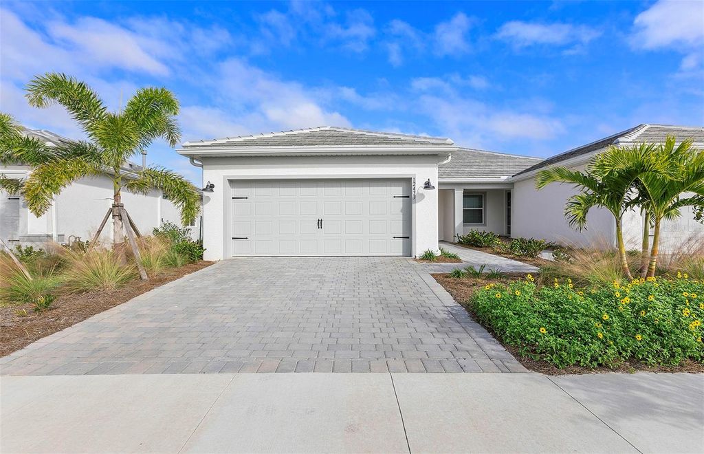 Photo of 1596 Tavira Place, Englewood, FL 34223 (MLS # TB8431069)