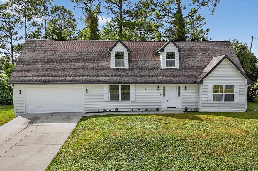 Welcome to this beautifully renovated 3-bedroom, 2-bathroom home located in the sought-after community of Lehigh Acres. Situated on a spacious 0.26-acre lot, this property combines modern updates with inviting charm. From the moment you arrive, you’ll notice the gorgeous curb appeal, manicured landscaping, and welcoming exterior. Step inside to discover brand-new luxury vinyl flooring, stylish light fixtures, and an open-concept floor plan perfect for both everyday living and entertaining. The kitchen is upgraded with stainless steel appliances, quartz countertops, and ample cabinet space. Each bedroom features ceiling fans, large windows, and plenty of natural light. The primary suite offers a beautifully renovated bathroom with a tile-lined shower and updated vanity. With its spacious yard, there’s plenty of room for outdoor gatherings, play, or simply relaxing and enjoying the Florida sunsets.