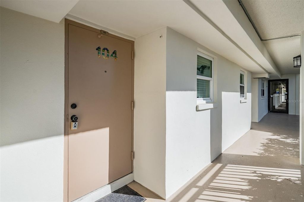 Photo of 9 Haig Place #104, Dunedin, FL 34698 (MLS # TB8447985)