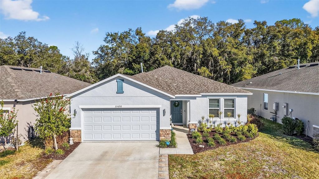 Photo of 33692 Sky Blossom Circle, Leesburg, FL 34788 (MLS # A4681025)