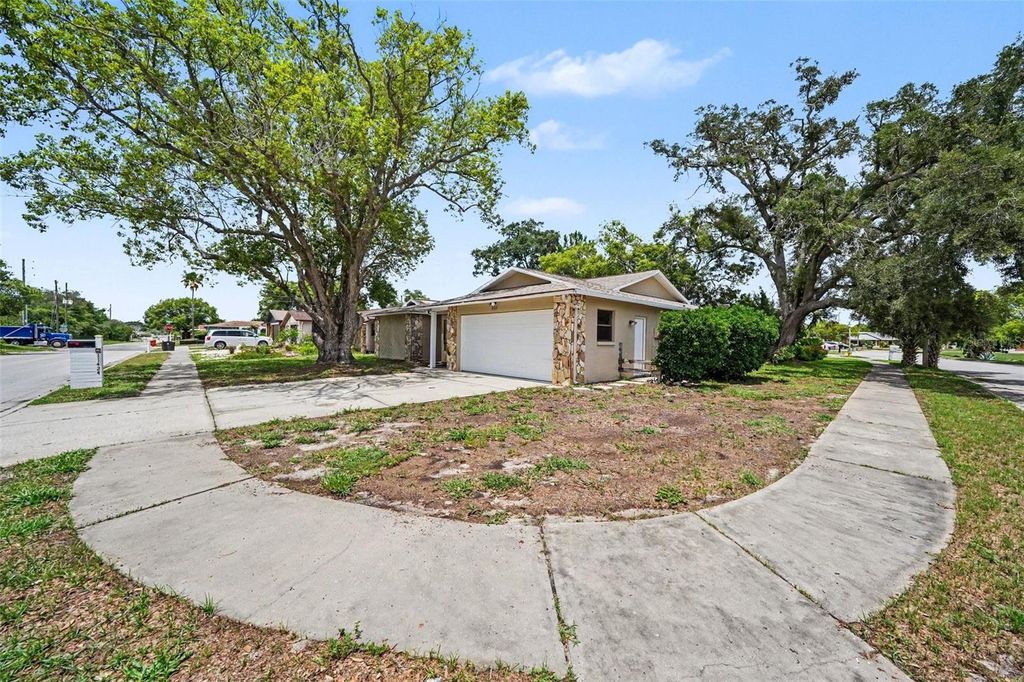 Photo of 11424 Scallop Drive, Port Richey, FL 34668 (MLS # O6411124)