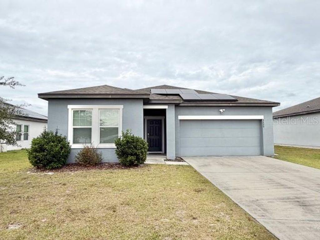 Photo of 3520 Patron Avenue, Deltona, FL 32738 (MLS # O6364647)