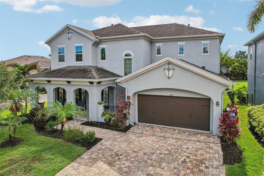 Welcome to paradise in the highly coveted Waterset community! This stunning, custom-crafted David Weekley pool home offers over 3,100 sq. ft. of pure elegance and open-concept Florida living. As you step inside, you are greeted by high ceilings, elegant crown molding, and abundant natural light, showcasing the meticulous craftsmanship throughout. 
The gourmet kitchen is a chef’s dream, completely open to the main living areas—perfect for entertaining. The first floor boasts a secondary bedroom with a full bath that leads to the pool.  Escape to the expansive Master Suite, a true sanctuary featuring soaring cathedral ceilings with a floating beam, plantation shutters, a chic barn door, and a spa-like "Super Shower" leading to a massive walk-in closet. At the top of the stairs, a versatile, large loft serves as the perfect game room or second living area, separating the spacious bedrooms.
Step outside into your private oasis: a pristine, fully screened-in saltwater pool, with an in-pool table & outdoor kitchen surrounded by mature landscaping and beautiful bamboo for ultimate privacy. Enjoy the resort-style Waterset lifestyle, complete with 3 community pools, water slides, fitness centers, clubhouses, a cafe, dog parks, and walking trails. Don't miss the chance to call this masterpiece home!
