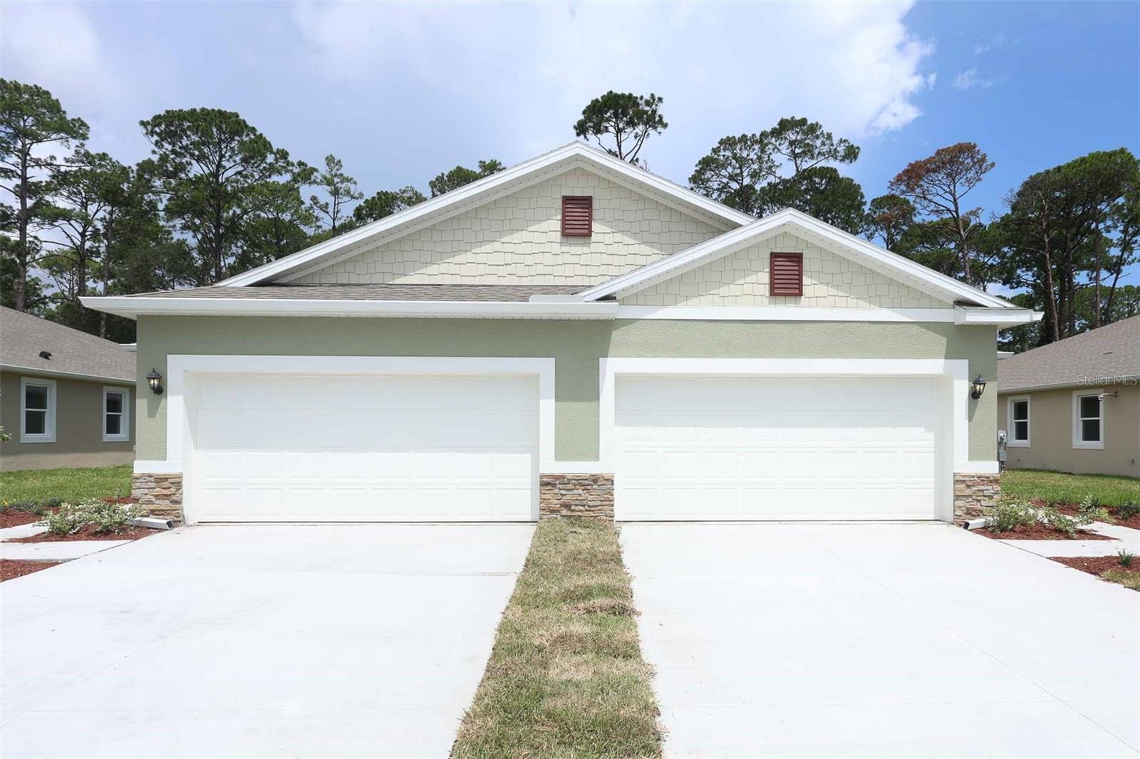 Under Construction. Halifax Plantation presents the Cambridge. This one-story home has all concrete block construction Villa features 2 bedrooms and 2 baths. As you enter the foyer you are greeted with a flex room with an option of french doors to create a work or play space. The kitchen overlooks the dining and great room, while having a view to the oversized outdoor living space. The well-appointed kitchen features an island with bar seating, plentiful cabinet with beautiful Quartz countertops and stainless steel appliances. Bedroom one, located at the back of the house for privacy, has an en suite bathroom with double vanity and two spacious walk-in closets providing ample space for storage.
*Photos are of similar model but not that of exact house. Pictures, photographs, colors, features, and sizes are for illustration purposes only and will vary from the homes as built. Home and community information including pricing, included features, terms, availability and amenities are subject to change and prior sale at any time without notice or obligation. Please note that no representations or warranties are made regarding school districts or school assignments; you should conduct your own investigation regarding current and future schools and school boundaries.*