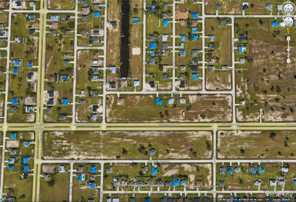 Photo of 1621 NW 7th Avenue, Cape Coral, FL 33993 (MLS # C7501077)