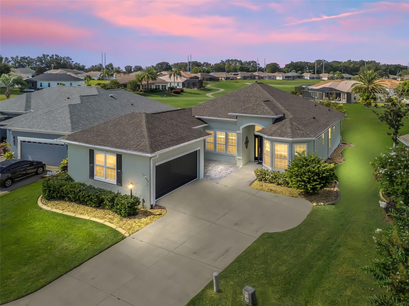 Entertaining home! Quick close possible!! Ideal QUIET location in STONECRESTS' COVETED NEIGHBORHOOD OF OVERLOOK III !!! LOCATED ON A CUL DE SAC, WITH A larger than usual PARK IN THE CENTER CIRCLE IN THE FRONT OF THE HOME AND THE BACK HAS VIEWS OF THE GOLF COURSE BETWEEN THE 5TH AND THE 17TH GREENS. This home is surrounded by the Championship golf course!!! This residence offers an open floor plan WHICH INCLUDES A DEN/OFFICE/swing room filled with thoughtful upgrades and modern finishes. The kitchen is a chef’s delight, featuring quartz countertops, professionally painted tall cabinets with over/under and inside remote contolled led colored lighting, a stainless steel single bowl sink, backsplash, LED recessed ceiling lighting, and a newer refrigerator with internal water dispenser* The common living areas offer luxury vinyl plank flooring, while 10’ and 12’ ceilings, crown molding, and arched entryways add elegance throughout. The enclosed FLORIDA ROOM is enhanced with HEAT AND AIR, WHICH ADDS AN ADDITIONAL 192 SF MAKING THIS HOME APPROX. 2,096 SF OF ENJOYABLE SPACE to live and entertain in. The Florida rm. also offers new LVP flooring, 2 sets of sliding glass doors offering 5 panes a glass, energy-efficient remote-controlled sunscreen, wainsott trim and pleated shades, provides the perfect year-round retreat. The oversized garage is a dream come true for the car enthusiast, with golf cart storage space, a mini split A/C (2024), insulated ceiling, pull-down attic stairs, additional electrical outlets, a utility sink, and an electric remote-controlled garage screen AND KEYPAD.**
Major updates include a new roof (2024), new HVAC (2024), and new windows (2022) in the dining room, dinette, and garage. Outdoor features include decorative pavers creating a beautiful patio or additional parking spaces, improved landscaping with stone accents, exterior lighting, gutters, a private mailbox, and a turn around extension on the driveway.* Additional highlight incl. a spacious primary suite with an oversized closet and keyed safe, plenty of storage, and fine finishing touches throughout.
This home is truly a gem waiting to be discovered—offering both comfort and style in a highly desirable location!
Today could be the BEST DAY OF THE REST OF YOUR LIFE! If you're searching for a home in a private, gated, golf community, look no further—you've found your dream lifestyle at Stonecrest. Nestled in the heart of Central Florida, Stonecrest is a deed-restricted, active 55+ golf community that offers the perfect blend of luxury, convenience, and recreation. Imagine waking up every morning in a community designed for those who cherish an active lifestyle, where golf cart access takes you to nearby shopping and more.
At Stonecrest, you'll have access to an array of world-class amenities, including four community pools, one of which is a serene indoor saltwater pool—along with a spa and a fully equipped fitness center. Whether you're looking to stay fit, relax, or meet new friends, you'll find it all here. With clubs to join, you'll never run out of opportunities to explore your passions and hobbies. The clubhouse is a hub of social activity, featuring a popular, casual dining restaurant where you can enjoy great food and even better company. For the golf enthusiast, Stonecrest boasts 18 holes of championship golf, providing a challenging and scenic experience. The fun doesn’t stop there—enjoy lighted pickleball courts, softball, and so much more.