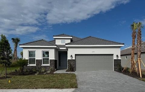 Photo of 13705 Iona Avenue, Palmetto, FL 34221 (MLS # TB8425432)