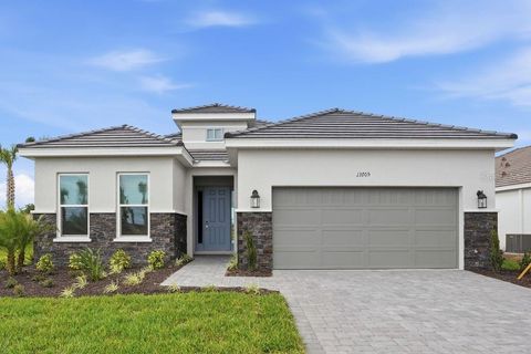 Photo of 13705 Iona Avenue, Palmetto, FL 34221 (MLS # TB8425432)