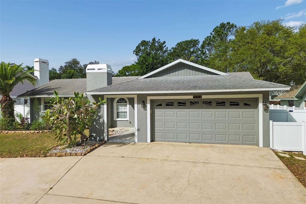 Photo of 2554 Rolling Oaks Drive, Palm Harbor, FL 34683 (MLS # TB8484579)