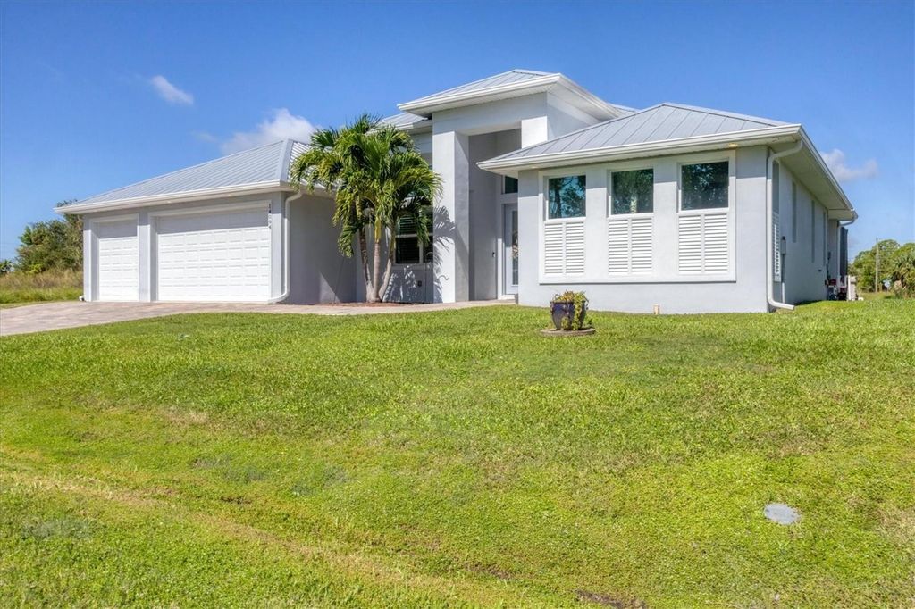 Photo of 14094 Edsel Drive, Port Charlotte, FL 33981 (MLS # D6143398)