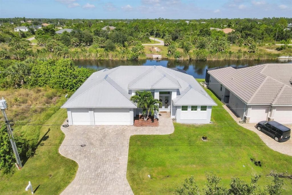 Photo of 14094 Edsel Drive, Port Charlotte, FL 33981 (MLS # D6143398)