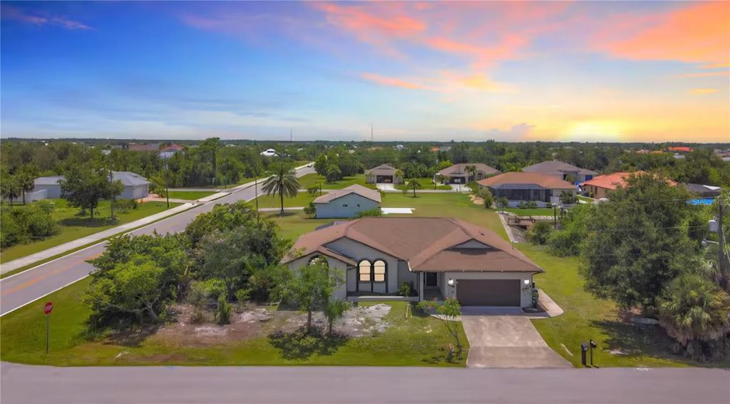 Photo of 9308 President Circle, Port Charlotte, FL 33981 (MLS # A4675057)