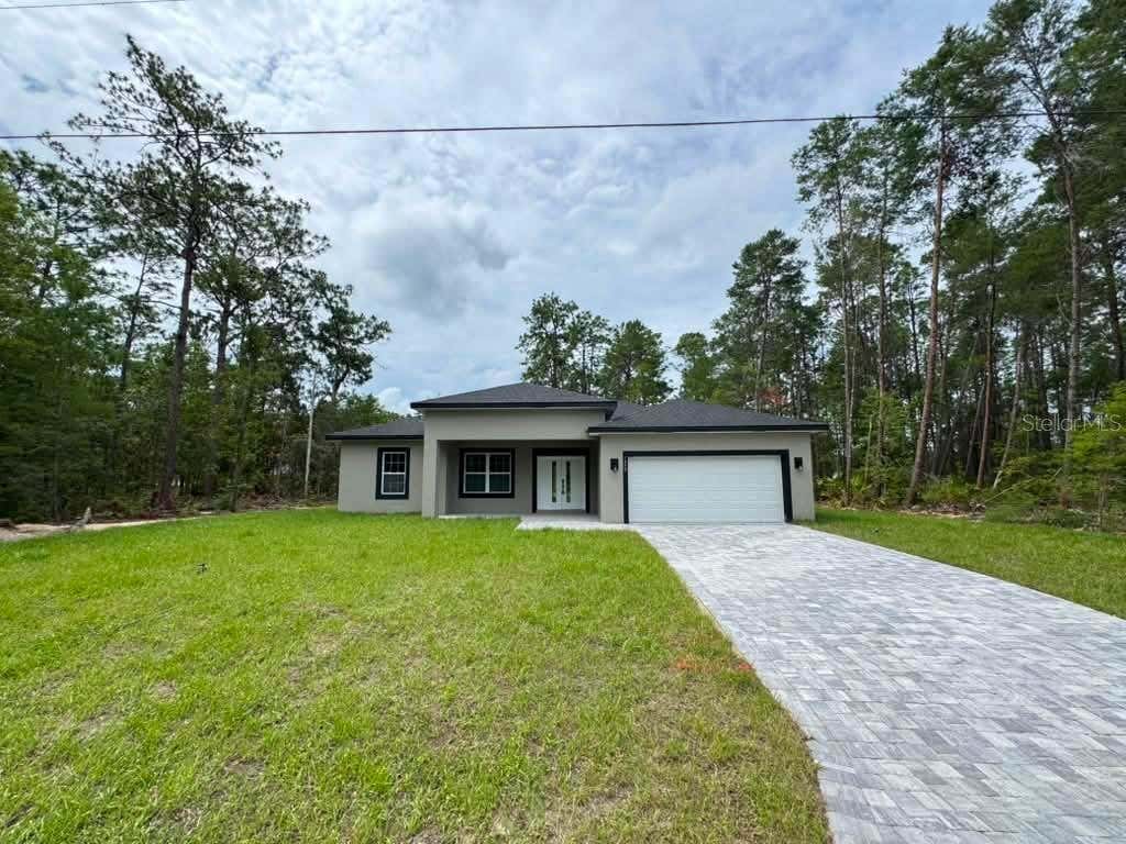 Photo of 1458 W Landmark Drive, Citrus Springs, FL 34434 (MLS # O6424187)