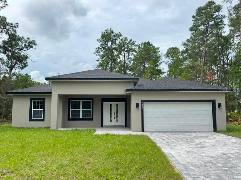 Photo of 1458 W Landmark Drive, Citrus Springs, FL 34434 (MLS # O6424187)