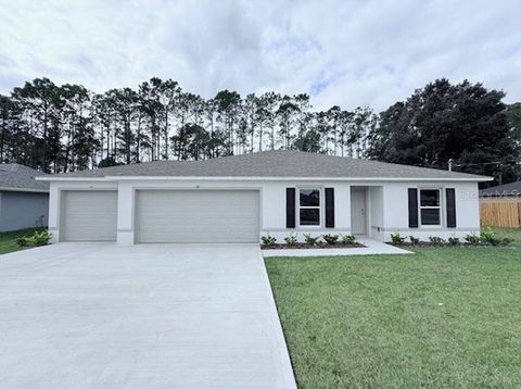 Photo of 10 Ryland Drive, Palm Coast, FL 32164 (MLS # C7518425)