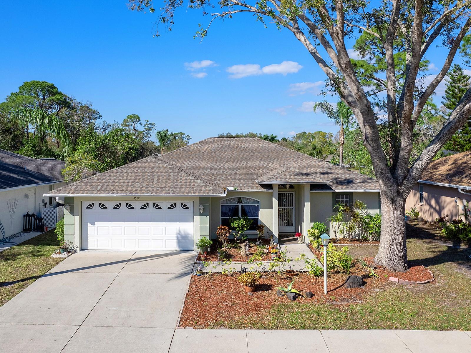 This charming three-bedroom, two-bathroom residence is situated in the quaint enclave of Pinewood Forest, and boasts a dynamic, central location.
Stepping into the foyer the inviting living room offers shimmering water views via the set of sliders. The relaxing in the tranquility, thanks to the neutral color palette.
The kitchen features a breakfast bar which provides a casual dining option and opens to the family room and additional dinette area.
Featuring a split plan the three bedrooms, each offer their own comfortable living space, while the master suite features an en-suite bathroom with walk in shower and spacious vanity. The additional two bedrooms share a nicely arranged bathroom, making this layout perfect for families or guests.
The showstopper here; is the spacious screened in lanai. Here you can take in the expansive water views, with its ideal exposure, making it a great spot for morning meditation or evening gatherings with friends and family.
The patio area offers both water and big sky views and is deal for barbecues or alfresco meals. The lawn area provides room for play, gardening and / or a pool addition.
Here the big-ticket items have been done, with a five-year young roof and brand-new AC installed in late June and Hurricane shutters offer peace of mind and lower home insurance rates. This quaint neighborhood consists of only 45 residences, and its ultra convenient location offers quick access to parks, public transportation and I-75. Or take the backroads and arrive within minutes to the acclaimed UTC mall with its abundant shops and restaurants.
So, whether you’re looking for a family home or a serene retreat, this offering is the perfect combination of comfort and convenience in a fantastic location. Don't miss the opportunity to make it yours!