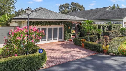 Photo of 2515 Sweetwater Country Club Drive, Apopka, FL 32712 (MLS # O6337211) Photo of 2515 Sweetwater Country Club Drive, Apopka, FL 32712 (MLS # O6337211)
