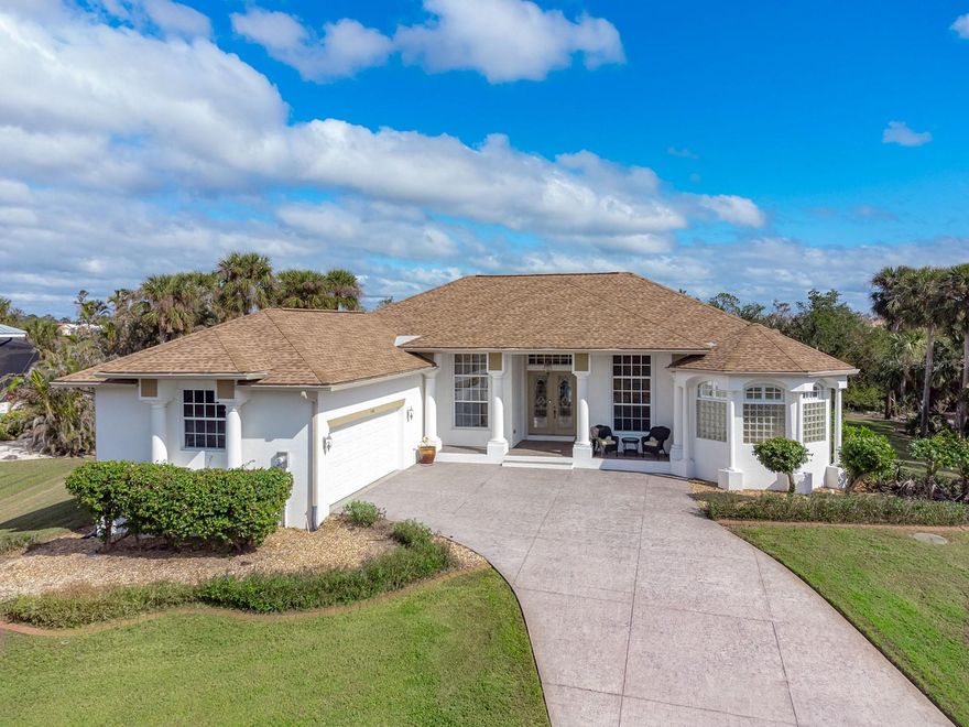 ELEVATED & ELEGANT featuring a 2021 ROOF + 2025 HVAC | This TURN-KEY FURNISHED, custom-built pool home by Newport Homes offers a perfect combination of elegance and functionality. Nestled on Amberjack Creek, the property boasts SERENE VIEWS OF THE CANAL AND PRESERVE while being strategically situated on high and dry land, eliminating concerns about flooding. The home’s interior features an abundance of natural light that fill the high ceilings through oversized windows and sliding glass doors along with a thoughtfully designed floor plan that is sure to please. An impressive great room with tray ceiling welcomes you along with a formal front dining room and a FORMAL OFFICE. The kitchen is stocked with everything you could possibly need in the cabinets and pantry and overlooks the breakfast bar, dinette as well as the back family room perfect for casual, everyday living. The primary bedroom is ample sized with views and access to the lanai, dual closets and an SPA-LIKE ENSUITE BATHROOM that features a soaking tub and roman shower. Two more bedrooms tuck down a hallway on the opposite side of the home with an oversized guest bathroom. The highlight of this property is the SHOWSTOPPING OUTDOOR POOL AREA with expansive lanai deck for relaxing or entertaining all protected by a screened enclosure and boasting an elevated spa with waterfall spill over and convenient outdoor pool bath. Heated for year round enjoyment, the saltwater pool and spa provide an incredible place to unwind in this tranquil setting. For fishing enthusiasts, shallow draft waters allow access to Coral Creek, offering opportunities for outstanding backwater fishing and convenient access to the Gulf of Mexico. Located just minutes from the famous town of Boca Grande and an array of charming shops and restaurants, this home is perfect for enjoying an active Florida lifestyle. Explore the nearby biking and walking paths, kayak or paddleboard at Don Pedro State Park, and take advantage of close proximity to golf courses, marinas, and world-class beaches! Additional features to note include the OVERSIZED GARAGE (almost 30 feet wide for all your storage needs!), interior laundry room, 4 sets of electric HURRICANE ROLL DOWN SHUTTERS, wired security system, central vacuum, exterior lawn sprinkler system and 2025 WATER HEATER.