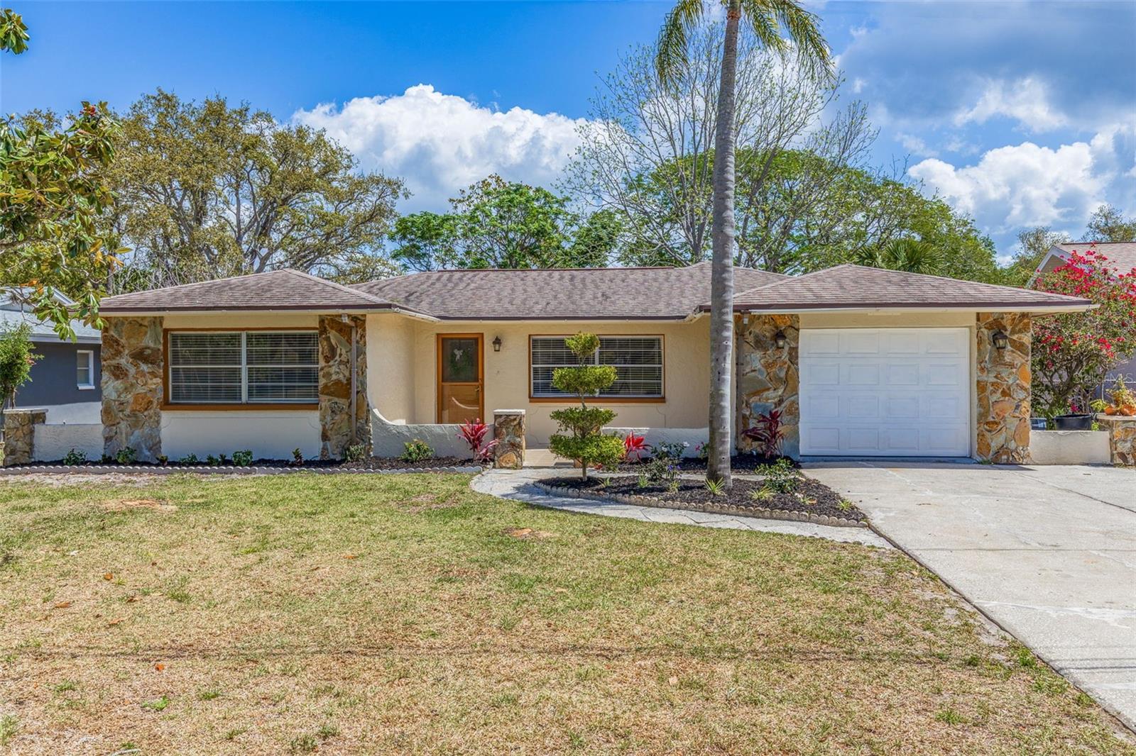 This beautifully renovated home offers exceptional comfort and value in one of Tarpon Springs' most desirable neighborhoods. Now available for rent, with a lease-to-purchase option—call for details!
Step inside to brand-new laminate flooring and a bright, open-concept layout that welcomes you home. The chef’s kitchen includes a large center island, Corian countertops, and stainless steel appliances, all flowing seamlessly into the spacious living and dining areas—ideal for entertaining or relaxing.
The primary suite features a walk-in closet, dual vanity, and luxurious double shower. One guest bedroom includes a private ensuite bath, while the third is conveniently located near a full guest bathroom. There's also a dedicated den/office space, an attached garage, and a full laundry room for added convenience.
Enjoy Florida living with a screened-in patio, wood deck perfect for grilling, and an upstairs sun deck to soak in the sunshine. Directly across the street is Riverside Park with a soccer field and newly renovated tennis/pickleball courts—perfect for active lifestyles.
Located just minutes from the famous Tarpon Springs Sponge Docks, you'll be close to waterfront dining, shopping, and cultural events. Fred Howard Park Beach is just a short drive away for beach days and sunset strolls.
Don’t miss this incredible rental opportunity—schedule your private tour today!