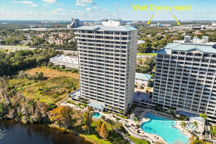 Discover a unique opportunity to own a beautifully appointed 14th-floor corner condominium at the renowned Blue Heron Beach Resort, where elevated living meets tranquil lakefront views. This elegant 2-bedroom, 2-bath residence offers a true resort lifestyle, showcasing sweeping views of Lake Bryan and spectacular nightly Disney fireworks, visible directly from the primary suite.
Thoughtfully designed with spacious living areas, the residence is filled with natural light from expansive bay windows and sliding glass doors. The open-concept floor plan is ideal for both everyday comfort and entertaining, seamlessly connecting the interior to multiple balconies that highlight breathtaking lake and skyline views. Residents enjoy access to outstanding resort amenities, including two heated swimming pools, a Jacuzzi spa, and a modern fitness center. Take peaceful walks along the private boardwalk, relax on the exclusive lakefront dock, or unwind on your balcony while enjoying unforgettable sunrises and sunsets over Central Florida. Whether used as a primary residence, vacation getaway, or income-producing short-term rental, this property offers an exceptional balance of luxury, comfort, and investment potential. Conveniently located just minutes from Walt Disney World, Universal Studios, SeaWorld, and Orlando’s premier shopping and dining destinations, Blue Heron Beach Resort delivers the perfect combination of proximity to attractions and the serenity of waterfront living. Schedule your private tour today and experience the exceptional views, refined ambiance, and resort-style lifestyle that set this residence apart.