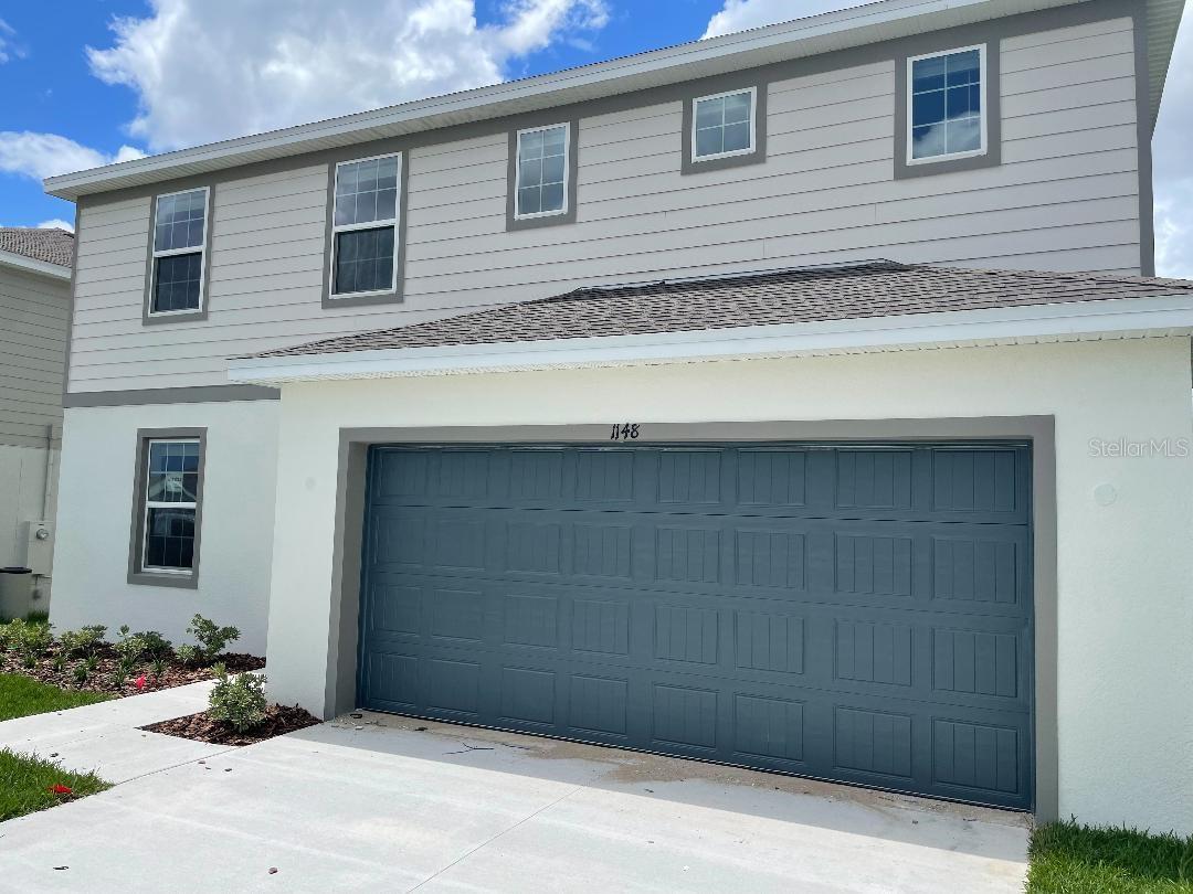 Gorgeous 5 bedroom, 3 bathroom home with community pool, and sidewalks. Located near the new Advent Health Hospital on US-27. One bedroom and full bathroom downstairs. Covered patio. Kitchen with backsplash and stainless-steel appliances. Must see.