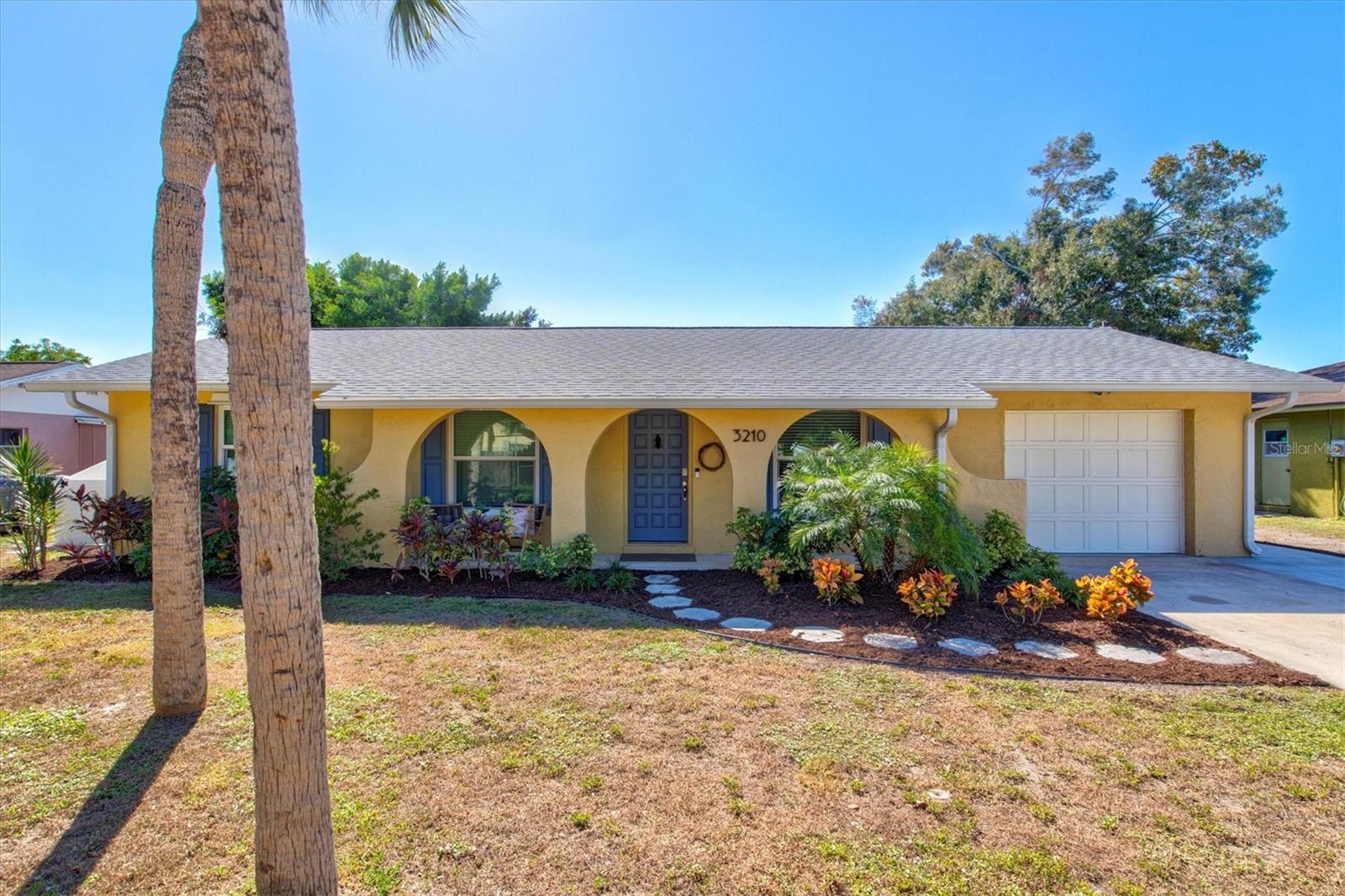 Welcome to "The Nest On Wood" a cozy & quiet 3 bed 2 bath POOL home w/ lake views that sits just a few steps from the Legacy Trail & is just a walk or bike ride from all of Sarasota's downtown amenities. Located less than 2 miles from Main St Sarasota & just 6 miles from Lido Key & Siesta Key, this house is warm & inviting w/ plenty of space to spread out & relax. Highlights include a heated salt water pool, dedicated work space, fully fenced backyard & screened lanai w/ bbq grill & lake views.
The Nest On Wood now offers a huge 32' by 14' heated salt water pebble tec pool with a built in 7' by 7' heated spa and large sun shelf. The backyard is now totally fenced with manicured tropical landscaping and lake views from the pool and screen enclosed lanai. There is also a large turf area and a BBQ area outside.
The bedroom configuration is as follows:
Master Bedroom:
King bed
2 nighstands
open shelving
closet
en suite bathroom
mounted flat screen tv
ceiling fan
2nd Bedroom:
King bed
2 nightstands
dresser
closet
mounted flat screen tv
ceiling fan
3rd bedroom:
Twin over Twin bunk bed
Separate full size bed
1 Night stand
Open shelving
Closet
The two guest rooms share a hall bathroom