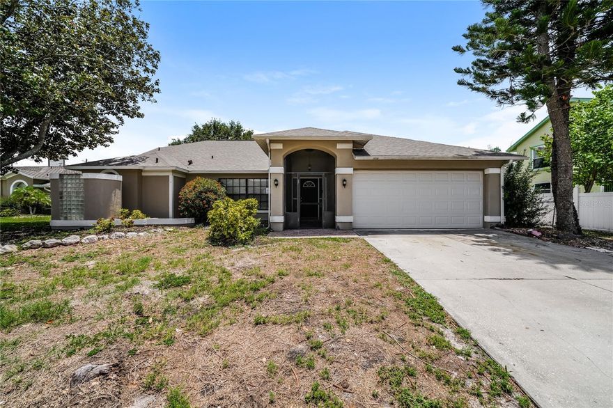 BRAND NEW ROOF just installed in May 2026! This amazing and spacious 3 bedroom, 2 bathroom, garage, and POOL home is sure to check all your boxes. Sat on over a 1/3 of an acre, you will be sure to fall in love from the moment you arrive! No detail was spared in the thoughtfulness of the build of this home! Enjoy the freshly painted interior with vaulted ceilings, multiple living spaces that allow you to truly customize to your liking, and NEW luxury vinyl flooring throughout the entire home! BRAND NEW Kitchen with soft close cabinets/drawers, granite countertops, recessed lighting, and an island perfect for entertaining or managing a busy household! Split floorplan with master bedroom boasting patio/pool access and an en suite bathroom complete with walk-in closet & shower, garden tub, and separate sink areas! Relax on your screened in back patio and float all your worries away in the pool! Pool deck just resurfaced! Huge fenced-in backyard and separate patio off pool deck! This is one you won't want to miss!