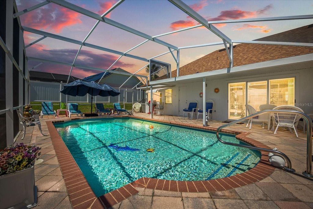 Photo of 5501 Loma Vista Drive E, Davenport, FL 33896 (MLS # O6393097)