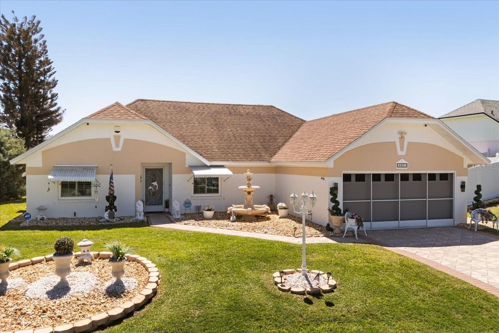 Photo of 5501 Loma Vista Drive E, Davenport, FL 33896 (MLS # O6393097)