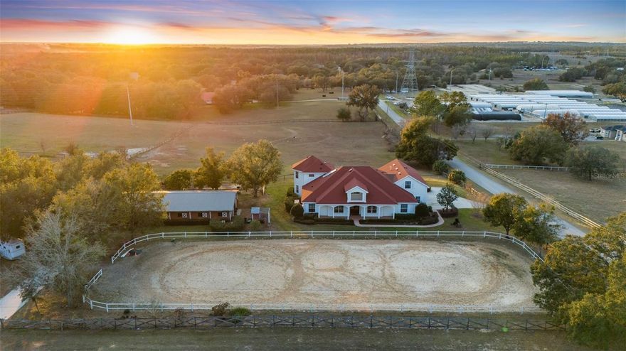 Under contract-accepting backup offers. **A RARE OPPORTUNITY YOU WON’T WANT TO MISS!!** 9.75 PRIME ACRES IN THE HEART OF WINTER GARDEN ~ MAIN HOME CUSTOM BUILT BY HANNIGAN HOMES 5BD/4BA/3-CAR- 5,423 SQFT, INCLUDING AN ABOVE GARAGE APARTMENT WITH 1/BD/1/BA/+KITCHENETTE ~ SECOND HOME ON PROPERTY INCLUDES 4BD/2BA/2-CAR - 2,082SQFT ~ 10-STALL + TACKROOM HORSE BARN - 2,592 SQFT, 3 PASTURES ~ FENCED IN RIDING RING AND MUCH MORE!  This countryside estate is an exclusive opportunity to own two homes, a horse barn, an adorable chicken coop, Koi pond, paver fire pit, built-in playground and so much more in the heart of the sought-after Winter Garden! Bring your horses and enjoy all that this massive CORNER LOT has to offer and being just minutes from the 429 gives you easy access to every convenience including neighboring HORIZON WEST and DISNEY THEME PARKS. Being sold all as one gives you endless opportunities in the ADDITIONAL SINGLE FAMILY HOME with the main home ready with charm for a family to make it their own. The long covered front porch welcomes you home and gives you front row seats to the riding ring. Built by Hannigan Homes, the main home was modeled after Disney’s Grand Floridian, and the thoughtful and unique features throughout are the perfect blend of comfort and quiet luxury. The roof was updated in 2019, the office space can serve as an additional bedroom, light and bright with views of the property, there is a movie/media room currently being used as an indoor trampoline park, WALK-IN WINE CELLAR for the adults, a fun HIDDEN WALK-IN PANTRY for ample kitchen storage and an energy saving SOLAR WATER HEATER. The new owner will absolutely fall in love with the PRIVATE PRIMARY SUITE that takes up the entirety of the second floor with sweeping views overlooking your estate, large WALK-IN CLOSET and well appointed ensuite bath. The additional bedrooms on the main floor give room to grow,  and the additional home and garage apartment graciously allow for multi-general living. This gorgeous property is best experienced in person (stunning sunsets included!) so it can speak for itself - call today to schedule your private tour today!