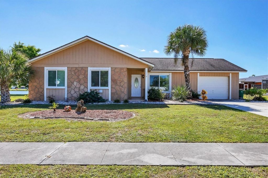 Photo of 13465 Overton Avenue, Port Charlotte, FL 33981 (MLS # C7516627)