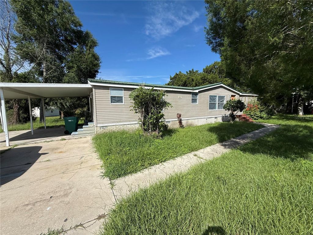 Photo of 13530 County Road 109e-1, Lady Lake, FL 32159 (MLS # OM712376)