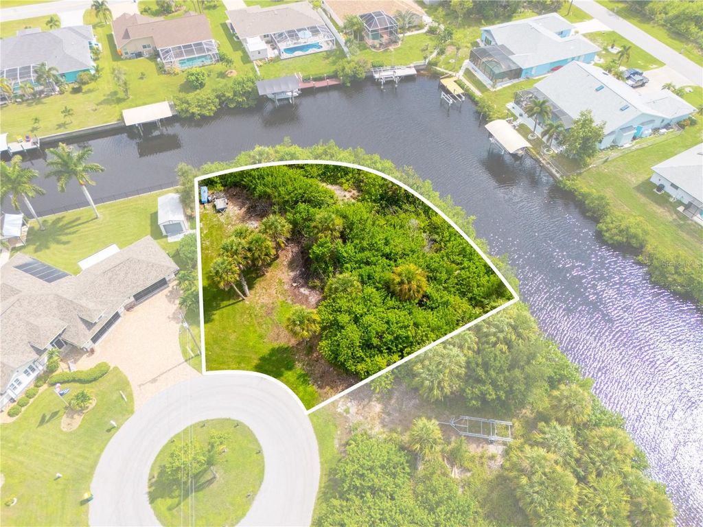 Photo of 4497 Bayview Street, Port Charlotte, FL 33948 (MLS # C7496569)