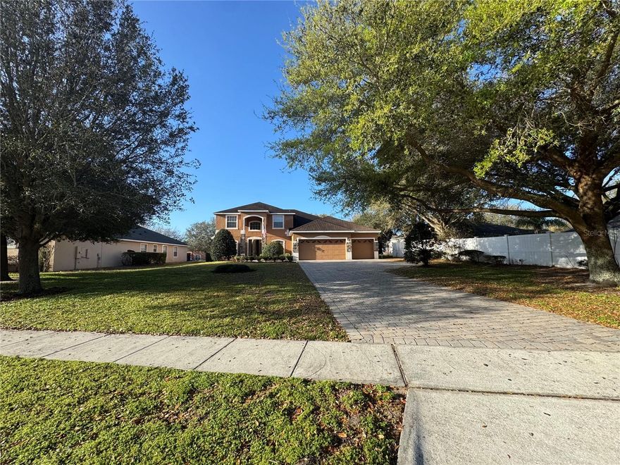Welcome home to Apopka’s Rock Springs Ridge. This 6 Bedroom 4 bath plus bonus room has new paint, carpet and many more recent systems upgrades. It is ready for it’s new owners. This premium lot home has plunty of extras. Screened pool & spa. Owners suite on the first floor. Gourmet style kitchen with 42-inch maple cabinets, double ovens and a large granite counter top island equipped with 3rd sink. Dining Room is very elegant, accent wood moldings on walls and triple crown molding. Living room has a fireplace for your enjoyment. kitchen/family room combo, this home is for those who like to entertain. Very convenient access to 429. Walking distance to Kelly Park School.