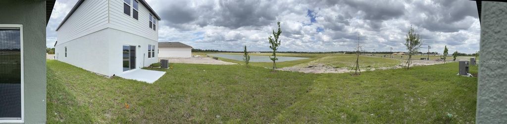 Photo of 10515 Curving Creek Loop, Parrish, FL 34219 (MLS # TB8501101)