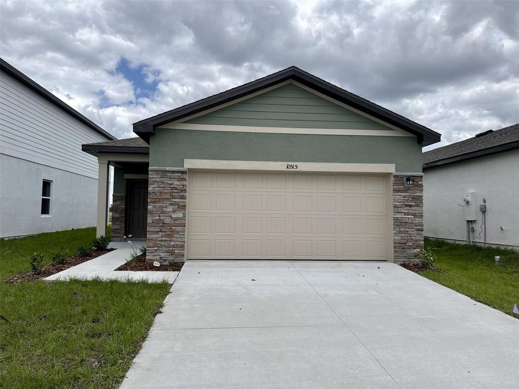 Photo of 10515 Curving Creek Loop, Parrish, FL 34219 (MLS # TB8501101)