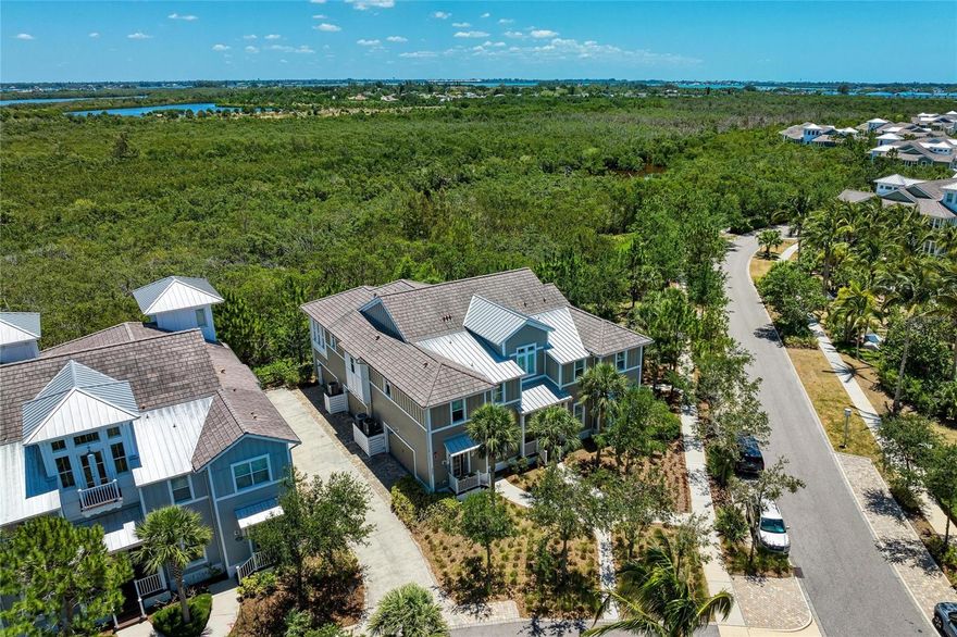 Great NEW price for this Beautiful Home. Come on in and live like you’re on vacation in the beautiful gated, much sought after, coastal
resort community of Harbour Isle! Start your mornings with a cup of coffee in your sunroom as
you watch the sunrise over the mangroves. Immaculate, light and bright condo with design
upgrades throughout — including whole house water filtration system, new washer, lighting
upgrades, custom window treatments, tile, engineered hardwood flooring, French doors, vaulted
ceiling with beams and fan, tray ceilings, crown molding, 5 1/4” baseboards, solid core doors
and private elevator that opens directly from your garage to your living space. The kitchen
features spacious 42” white wood cabinets, stainless appliances, Bosch dishwasher, granite
counters and a large island with breakfast bar. The Owners Suite has amazing serene preserve
views, en-suite bath with dual vanities, shower and large custom designed walk-in closet. The 2nd bedroom has
an en-suite bath, allowing your guests privacy. The third bedroom has a beverage center
and can be used for an office also. The 3rd bath is large and
conveniently located in the hallway and easily accessible from the main living area. Some furniture from sunroom, den, and kitchen are included.
The large 2-car garage, lined with heavy duty storage shelving, has 12’ ceilings and also features a huge storage
closet. The building features green LEED certification, block construction with Hardie board exterior siding and PGT impact rated windows. 
Local HOA fees include high speed internet and cable, amounting to great savings. While inside the
gate at Harbour Isle, explore 2 miles of neighborhood paths and find an inviting hammock for an
afternoon siesta directly in front of the home. Stroll the FOUR heated nearby neighborhood pools with outdoor grills, cabanas, fire pit
and kayak launch for the 38 acre lake. End the day with an incredible sunset at the amazing
23,000 sq. ft. Beach Club overlooking Anna Maria Sound. The Beach Club features resort-style
amenities with the Sky Bar, Lounge, Pavilion, Fitness Center, Yoga Lawn, Event Lawn and
private beach where you can launch your kayak in the Sound. Just outside the gates of
Harbour Isle you’ll find the new Jimmy Buffett Margaritaville inspired Compass Hotel, Safe
Harbour Marina with wet and dry storage and Floridays waterfront tiki restaurant. Cross the
bridge and you’re on Anna Maria Island with its sugar sand beaches and quaint island charm.
Wait no longer! It’s time to live your best life. Live, relax, enjoy an active lifestyle and/or work
from home in award winning Harbour Isle!