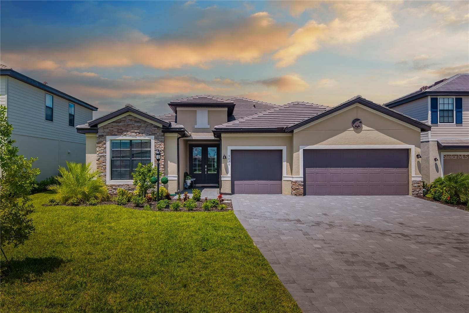 Welcome to this stunning Summerville model in the heart of the sought-after Lorraine Lakes community! This spacious 3-bedroom, 3-bath home also features a dedicated office, perfect for working from home or creating your own hobby space. Designed for both everyday living and entertaining, the open-concept layout flows seamlessly to the private screened pool area, where you’ll enjoy serene views with no neighbors behind you.
The chef’s kitchen offers abundant counter space, premium finishes, and a functional layout ideal for hosting. A 3-car garage provides ample storage for vehicles, tools, and toys. Located in a resort-style community, you’ll have access to incredible amenities including a clubhouse, fitness center, pool, sports courts, and restaurant .
This is more than builder-ready — it’s fully upgraded and move-in ready, offering comfort, style, and privacy in one of Lakewood Ranch’s most desirable neighborhoods. This model no longer available with builder.