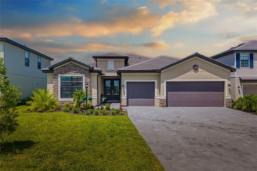 Welcome to this stunning Summerville model in the heart of the sought-after Lorraine Lakes community! This spacious 3-bedroom, 3-bath home also features a dedicated office, perfect for working from home or creating your own hobby space. Designed for both everyday living and entertaining, the open-concept layout flows seamlessly to the private screened pool area, where you’ll enjoy serene views with no neighbors behind you.

The chef’s kitchen offers abundant counter space, premium finishes, and a functional layout ideal for hosting. A 3-car garage provides ample storage for vehicles, tools, and toys. Located in a resort-style community, you’ll have access to incredible amenities including a clubhouse, fitness center, pool, sports courts, and restaurant .

This is more than builder-ready — it’s fully upgraded and move-in ready, offering comfort, style, and privacy in one of Lakewood Ranch’s most desirable neighborhoods. This model no longer available with builder.