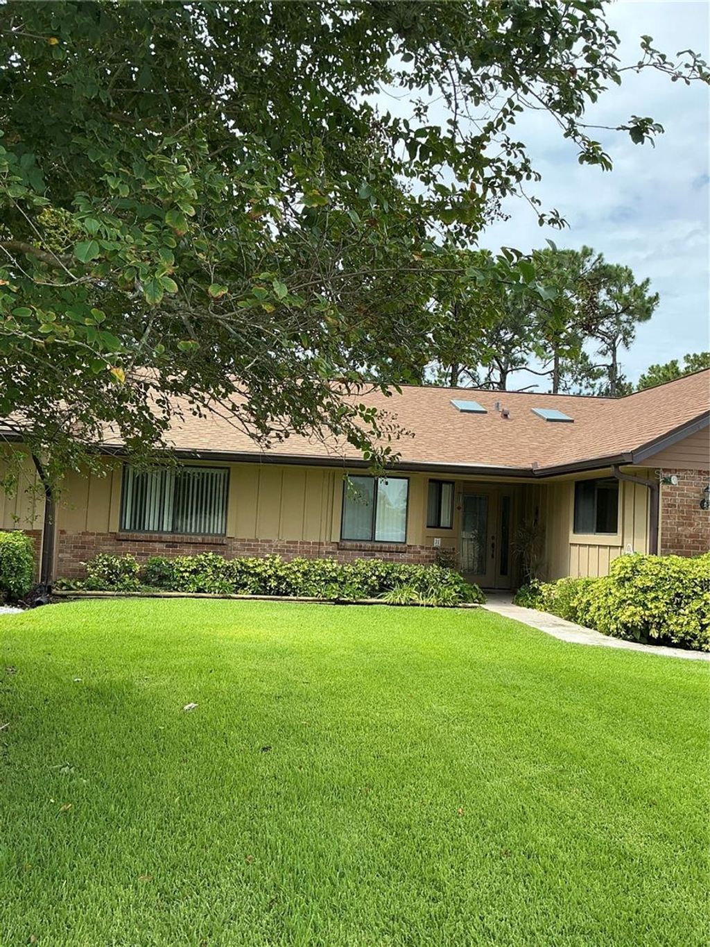 Photo of 31 Lake Fairgreen Circle, New Smyrna Beach, FL 32168 (MLS # NS1085470)