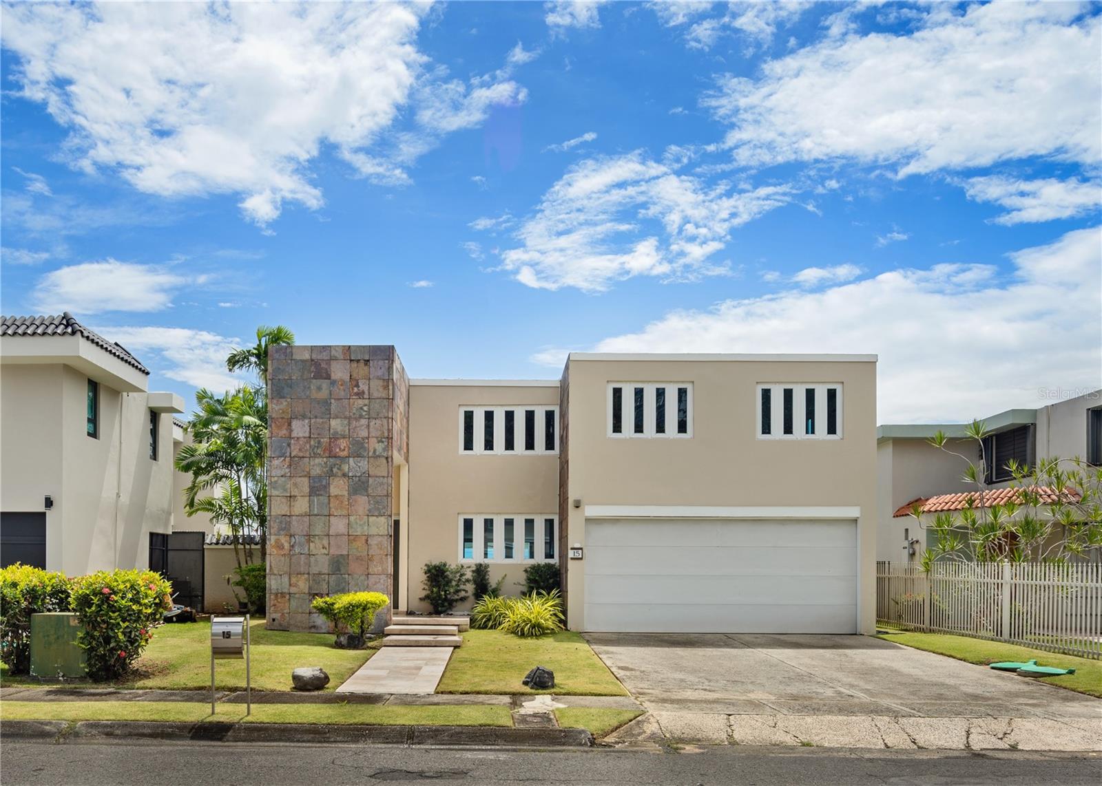 Welcome to this beautifully renovated 5-bedroom home located in the secure, family-friendly community of Mansiones de Alejandrino. This residence is filled with natural light, offering a bright and inviting atmosphere perfect for both entertaining and everyday living.
The open-concept layout seamlessly connects the living, dining, and kitchen areas, creating a spacious and modern flow. The home features four generously sized bedrooms, including a serene master suite with a private bathroom and a large walk-in closet.
Step outside to your own private retreat—a landscaped yard with a pool, perfect for relaxing or hosting gatherings. The home also includes a generator, providing added peace of mind.
Centrally located just minutes from top schools, restaurants, shops, and the beach, this property combines comfort, convenience, and style—all within a gated, secure community ideal for family living.