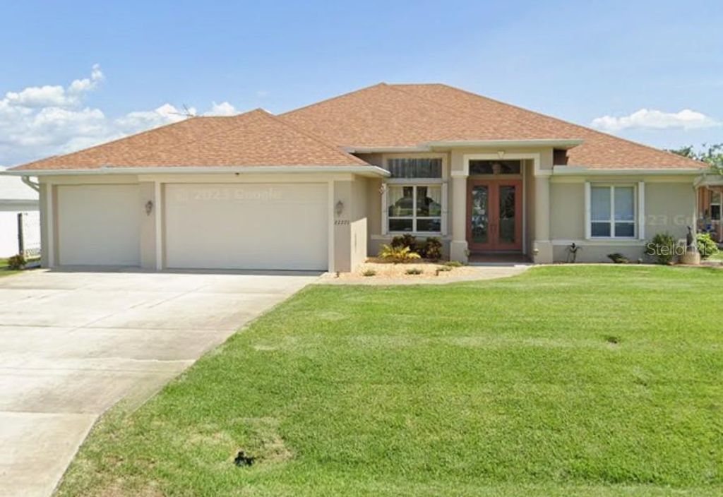 Photo of 22277 Priscilla Avenue, Port Charlotte, FL 33954 (MLS # D6145862)