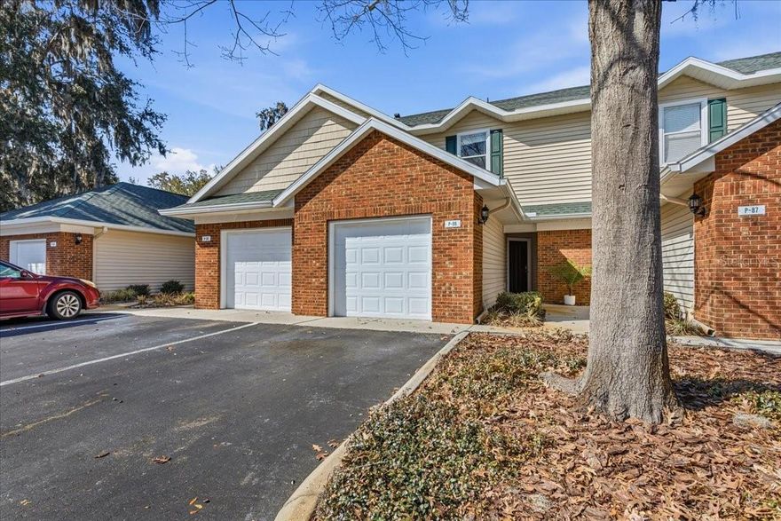 Located in the gated community of Greens at West End, this well-maintained brick townhome blends comfort, function, and convenience.

Offering 2 spacious bedrooms and 2.5 bathrooms, the layout is designed for easy living. The open-concept main floor features a generous kitchen with breakfast bar that flows seamlessly into the dining area, finished with tile flooring for durability and style. The living room is filled with natural light and highlighted by luxury vinyl plank flooring and a sliding glass door that opens to a screened-in patio with additional storage — the perfect spot to unwind.

Upstairs, both bedrooms offer privacy and comfort. The primary suite includes a walk-in closet and an en suite bath with dual vanities, while the second bedroom also features its own private full bath and walk-in closet — ideal for guests or roommates. The home is hard-wired with Ethernet throughout, providing reliable connectivity for remote work or gaming.

An attached garage adds everyday convenience, and residents enjoy access to resort-style amenities including a fitness center, pool, hot tub, tennis courts, and basketball courts at the community clubhouse.

Positioned west of I-75, this property is just minutes from Tioga Town Center, Publix, and a wide selection of dining and entertainment options — making it an ideal place to call home.