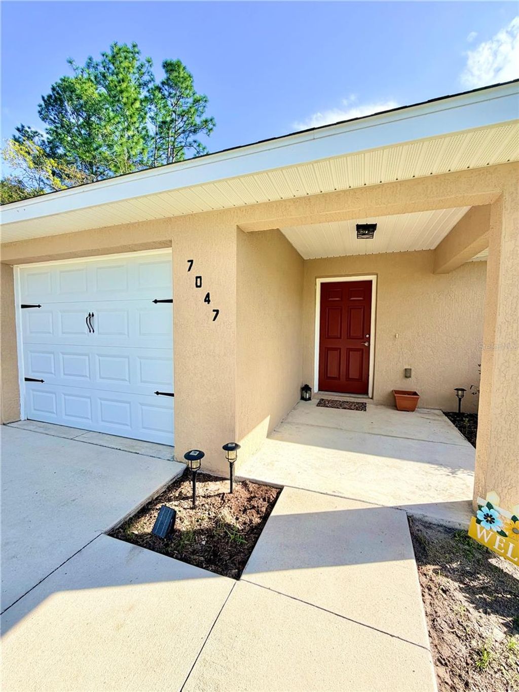 Photo of 7047 SW 131st Loop, Ocala, FL 34473 (MLS # R4910880)