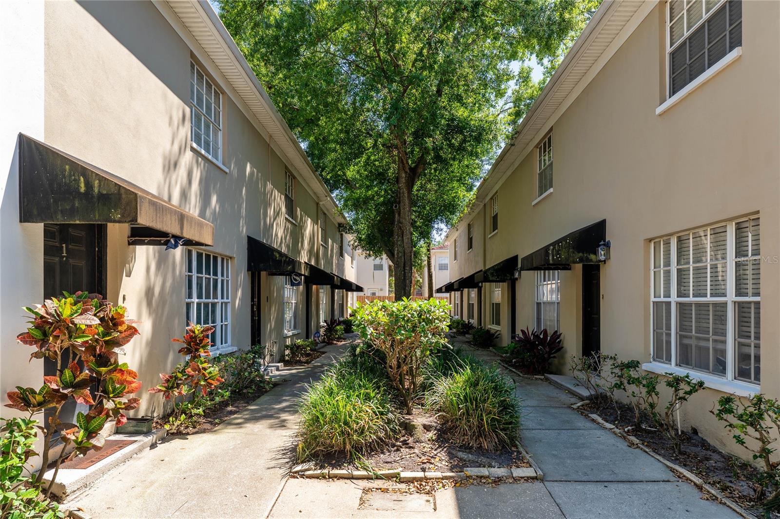 STUNNING SOUTH TAMPA TOWNHOME in coveted Hyde Park district! This gorgeous 2BR/1.5BA unit offers beautifully designed living space with soaring ceilings and an open floor plan perfect for modern living. The fully renovated kitchen and bathrooms with stainless steel appliances flow seamlessly into the spacious living area, creating an ideal entertaining space in the heart of Tampa. Plenty of extra storage in the attic space provides abundant room for all your belongings. The private back patio with artificial turf creates the perfect low-maintenance entertaining space for year-round enjoyment. This move-in ready home features a new roof installed in 2021 and requires no flood insurance, providing peace of mind and cost savings for the new owner. The prime location puts you steps from Tampa's hottest restaurants, trendy nightlife, and boutique shopping, with easy walking access to Hyde Park Village, 7 minutes to Bayshore Boulevard, 9 minutes from Tampa General, and 9 minutes from downtown Tampa. Residents enjoy convenient access to MacDill AFB, Westshore business district, and 14 minutes to Tampa International Airport, while being zoned for the sought-after Plant High School. This rare South Tampa opportunity won't last long, so schedule your showing today before it's gone!