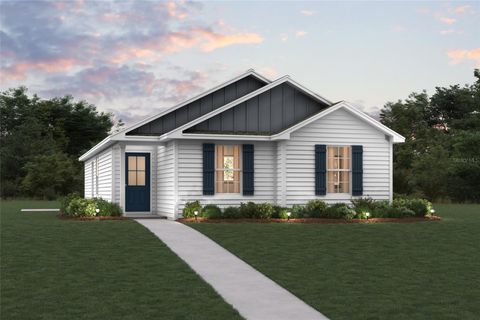 Photo of 5513 Nutwood Avenue, Bunnell, FL 32110 (MLS # C7513789)