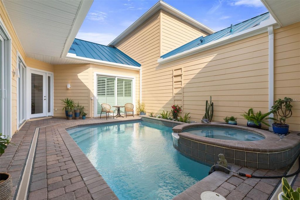 Photo of 4642 Riverwalk Village Court, Ponce Inlet, FL 32127 (MLS # FC317916)