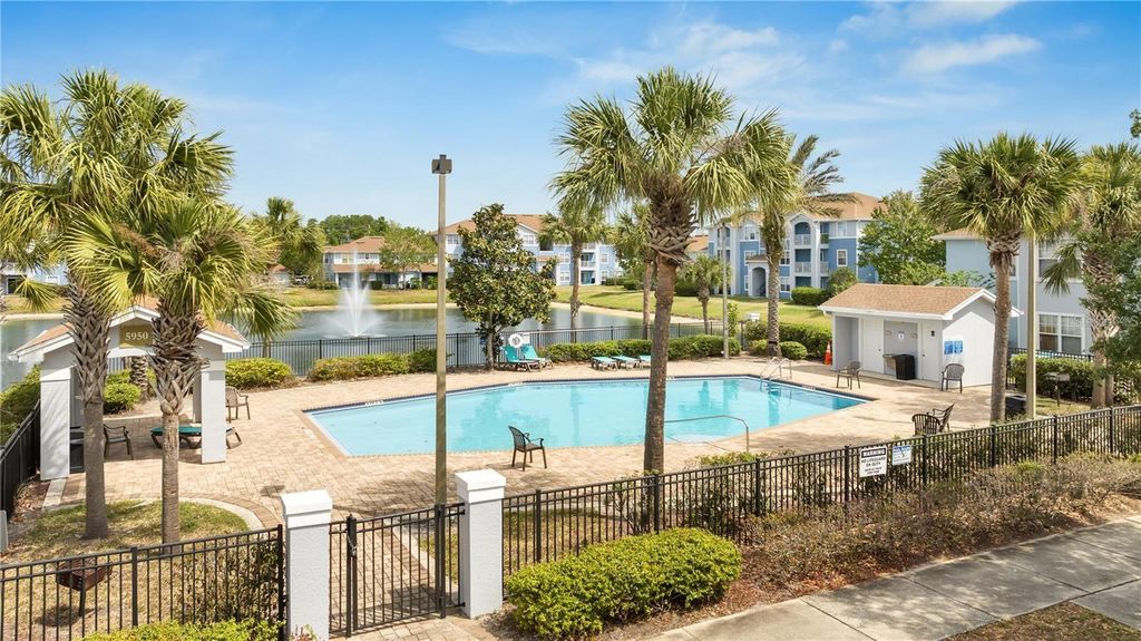 Photo of 5902 Lake Pointe Village Circle #309, Orlando, FL 32822 (MLS # O6356073)