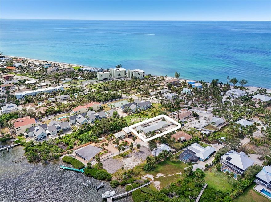Salt Air, Sunshine, and the Sounds of the Gulf on Manasota Key! This furnished three bedroom, two bathroom, two car garage pool home will make every day feel like a vacation. Nestled between the Gulf and Intracoastal Waterway you have deeded access to both so you can easily boat the waterways during the day, head back for a dip in your saltwater pool or spa and then hop over to the beach and catch a beautiful sunset. Situated on an oversized lot in a highly sought after neighborhood offering you a Florida Lifestyle like no other! This completely renovated home features a multitude of custom upgrades. Outside you will find the entire back yard is fully privacy fenced with double gates and the xeriscaped yard lets you spend time enjoying life, not mowing grass. Inside, you’ll find a good sized living area, a kitchen that features granite countertops, rich wood cabinetry, an island with breakfast bar, and there are also beautiful terrazzo floors throughout that bring timeless character to the interior. Hurricane-rated impact windows and sliding glass doors provide comfort and peace of mind. This home has been impeccably maintained and has many updates including a new 2024 roof. Major systems such as the plumbing, electrical, and HVAC were updated in 2013 along with the addition of the heated pool and spa. The ensuite master bedroom is the perfect retreat with sliding doors to access the back yard, large walk-in closet while the master bathroom has 2 separate granite topped vanities and large frameless glass walk-in shower. The guest bedrooms are both spacious and the shared bathroom doubles as a pool bath for convenience and also has a tiled tub shower combo and oversized granite topped vanity. The interior laundry room has a rear yard access door and built-in desk space. The backyard is a true oasis, offering everything you need for relaxation and fun without ever leaving home. A spacious partially covered lanai features built-in cabinets, plenty of room for patio furniture, and a convenient storage closet. The sparkling heated and saltwater pool and spa provide the perfect spot to unwind, while the firepit sets the scene for cozy evenings with friends and family. A short stroll down the lane to the east leads to the deeded/shared dock and bay access, perfect for fishing, kayaking, or simply taking in the peaceful wide-water views. With Stump Pass only a few miles away, access to the Gulf is quick and convenient. Head west and you’ll find the deeded beach access, where you can sink your toes into the sand, go shelling, or search for sharks’ teeth along the shoreline. Perfectly situated, this home allows you to have it all just outside your doorstep. Nearby, you’ll find restaurants, tiki bars, and live entertainment, so you can enjoy a fantastic meal, listen to music, and then return home to your peaceful coastal retreat. Two public boat ramps are also close by. With no deed restrictions and plenty of room for boat or RV storage right on the property, this home is ideal for those who love an active Florida lifestyle. Within a 15-mile radius, there are more than a dozen golf courses, pickleball courts, walking trails, parks and more offering even more ways to enjoy the outdoors. This home at 6027 Manasota Key Road has everything you need to live everyday like you are on vacation. Contact us to schedule your private showing.