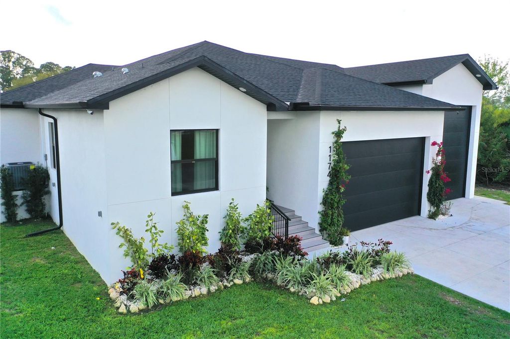 Photo of 1174 March Drive, Port Charlotte, FL 33953 (MLS # A4686446)